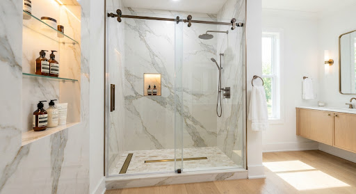 Interior luxury walk-in shower in Hurricane Lake Estates Bryant Arkansas. Elegant floor-to-ceiling Calacatta gold marble